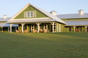 Agricultural Building with Green Metal Siding and Gray Metal Roof