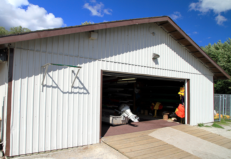 Workshop Metal Building with White Metal Siding and Brown Metal Roofing