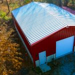 Centra Series Metal Building with Red Metal Siding and White Metal Roofing