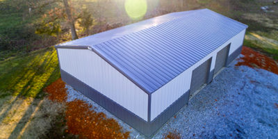 Centra Series Metal Building with White Metal Siding and Blue Metal Roofing